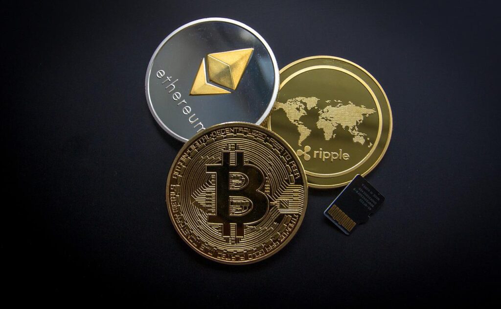 Bild på krypto. Etherium , bitcoin och ripple. Hur man betalar skatt på krypto